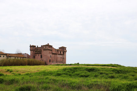 the castle of Santa Severa on a cold winter day. The cloudy white sky. In Lazio, Italy, Romeのeditorial素材