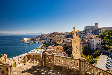 Gaeta, Latina, Lazio, Italy. A splendid view of the city. The ancient village with its houses overlooking the sea, seen from the top. The Angevin Castle at the top. The harbor with its moored boats.の写真素材