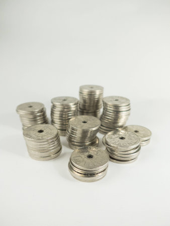 stacks of norwegian money kroner on a white background