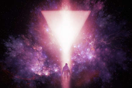 A mystical concept. Of a mysterious man silhouetted against a light beam and the universe.の写真素材
