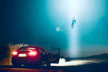 An alien encounter of a woman being abducted and floating in the sky by a UFO, next to her car at nightの写真素材