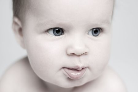 Blue eyed baby close-up の写真素材