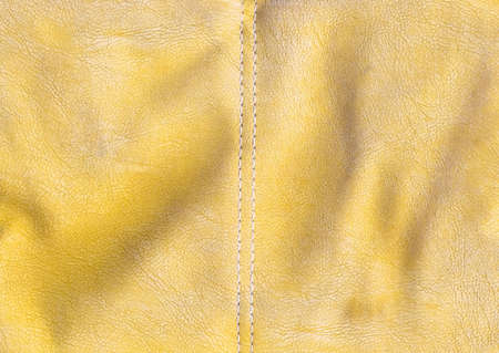 Natural yellow leather texture to backgroundの写真素材