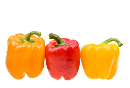 Close-up color paprika with water drops isolated on white background