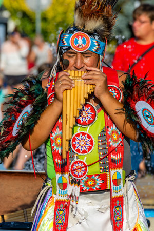 Indian plays the music on the street in Karwia (Poland)のeditorial素材