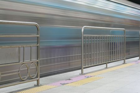 Fast Moving Train approaching station