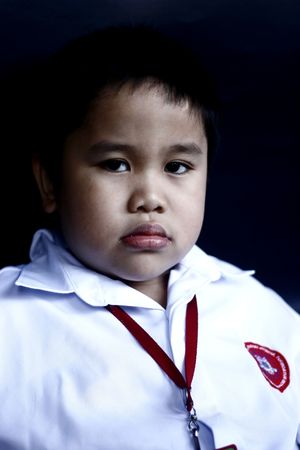Intense Young Boy with an enigmatic expression.の写真素材