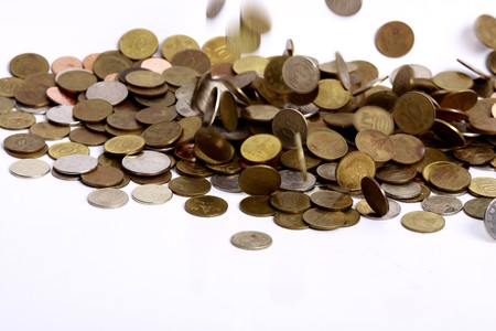 Dropping coins concept の写真素材