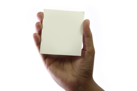 Hand holding blank business card with copy space.の写真素材