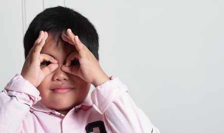 Portrait of a happy boy with expressionの写真素材