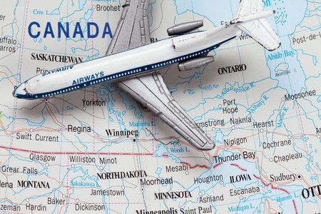 Toy Airplane on Map of Canada shallow depth of field from use of macro lens 