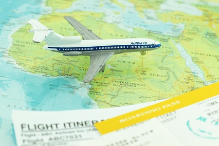 Travel and flight concept with boarding pass and flight itinerary