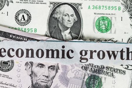 Economic growth abstract- five dollar close up shot.の写真素材