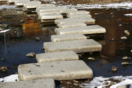 Crossing the river - slab of stone arrange to cross the river.の写真素材