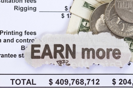 Earn more abstract - dollar with spread sheet documents.の写真素材