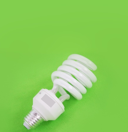 spiral bulb laid on a green backgroundの写真素材