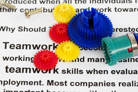 Gears abstract for cooperation and teamwork- with definition of teamwork background の写真素材