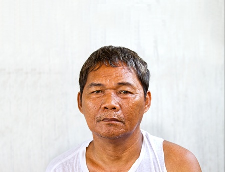 A homeless man begging for work and food の写真素材