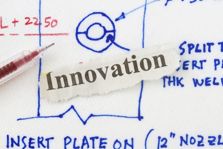 Innovation newspaper cut out in a concept idea drawn in a napkin.の写真素材