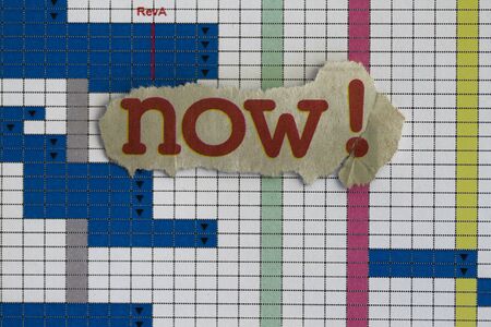 Schedule with now newspaper cutout and graph の写真素材