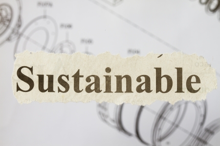 Sustainable newspaper cutout with engineering drawing in the background の写真素材