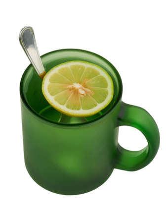 drink from a fresh lemon from a beautiful green mug for utaleniya thirst in hot day.の写真素材