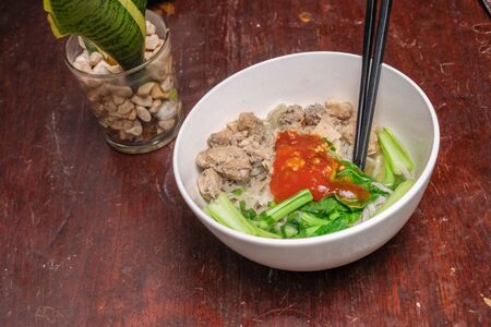 healthy organic chicken noodles with vegetablesの写真素材