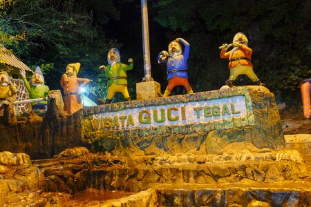 Tegal, Indonesia -July 6 2019: dwarf statue on Guci hotspring
