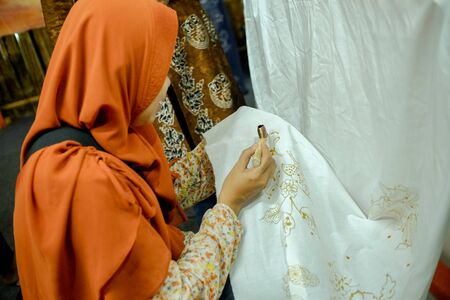 Batik Javanese traditional clothes, making process manually.
