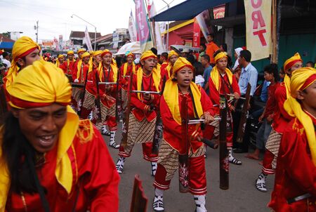 BANYUMAS, INDONESIA - February 8, 2009: People from many culture, age and sex celebrating Imlek or Chinese New Year on the street by paradeのeditorial素材