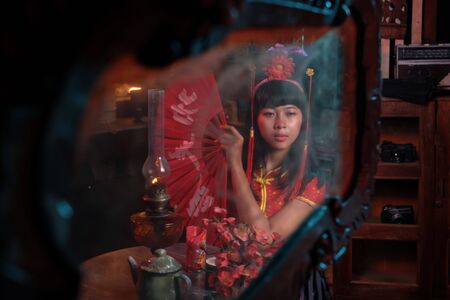 Purbalingga, Indonesia - November 23rd 2017: asian girl wears chinese costume in red theme...
