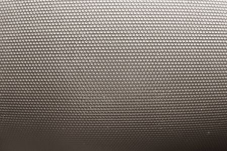 oscar leather imitation on car dashboard pattern in sephia colorの写真素材