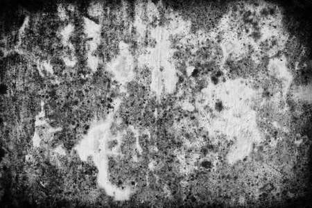 Abstract mossy grunge concrete wall texture. Use as a background or wallpaper. Space for text. Black and white, so contrast and grainyの写真素材