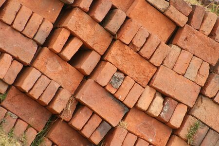 Handmade adobe bricks stacked at a building construction site in Otavalo, Ecuadorの写真素材