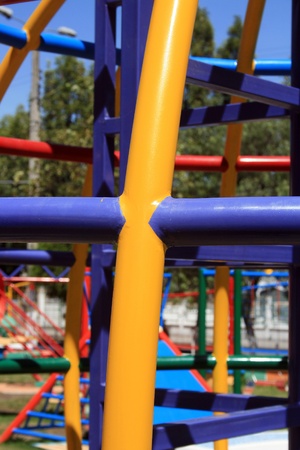 Colorful pipes used in a piece of playground equipment in a park in Otavalo, Ecuadorの写真素材