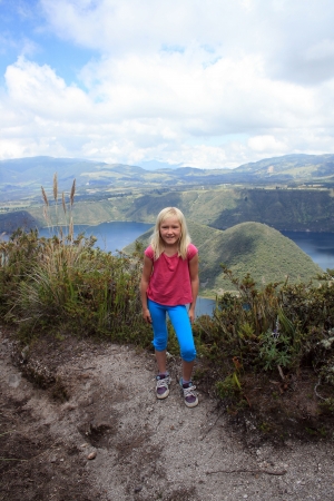 A pretty young girl on the hiking path around Lake Cuicochaの写真素材