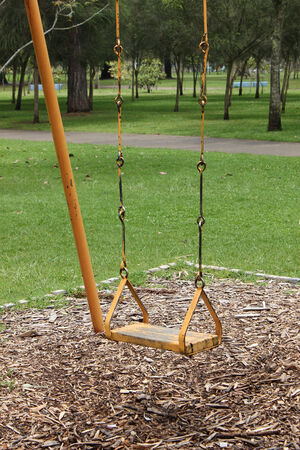 A metal swing in a park in Quito, Ecuadorの写真素材