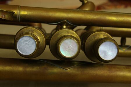 The keys and tubes of a brass trumpetの写真素材
