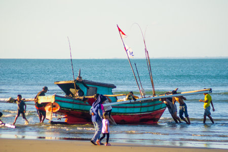 Fishing boats on the beach in Sri Lanka, Sri Lanka.の写真素材