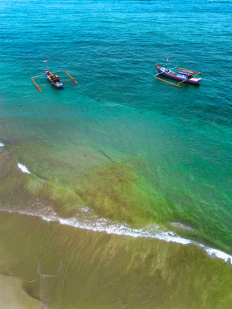 Natural view of Indonesian beach with white sand and blue sea on a clear morning