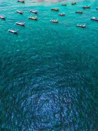 Natural view of beach with white sand and blue sea on a clear morningの写真素材