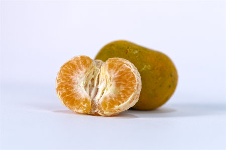 Fresh Orange Segments on a White Background