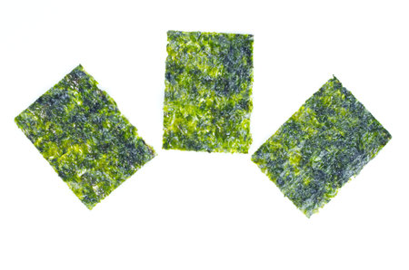 Green Seaweed Sheets Isolated on a White Backgroundの写真素材