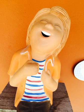 smiling doll in gardenの素材