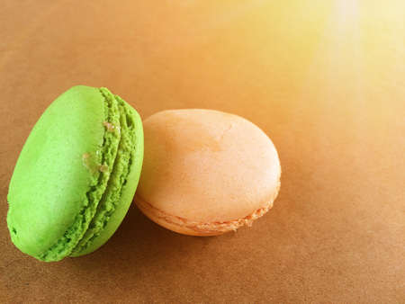 macaron on wood background has the sunlight shadeの素材