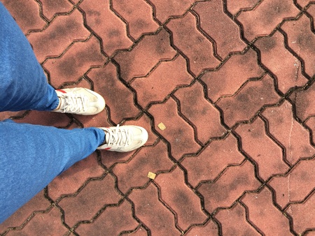 Standing on the vintage  groundfloor, walking street conceptの素材