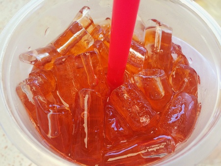 close up Iced Lemon Tea in clear plastic cup on summer timeの素材