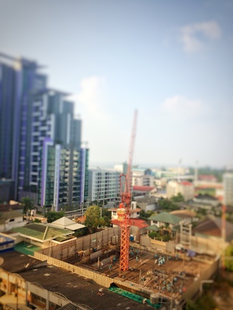 Blurry picture of resident construction because increase people in the city and growth business conceptの素材