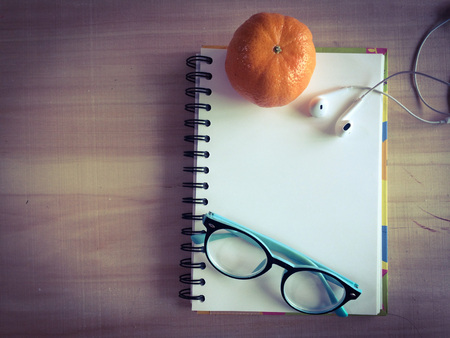 blank notbook on working desk with copy space for create job or education or anything if you wantの写真素材