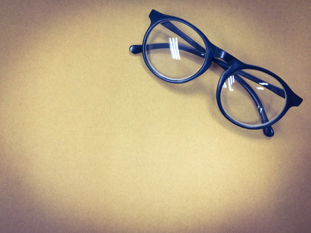 top view and copy space of glasses on brown backgroundの写真素材